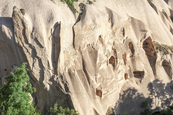 Houses digged in sandstone cliff