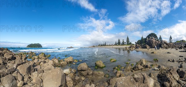 Sandy beach beach of Mount Manganui with island Motiti Island