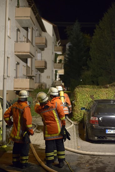 Firefighters on site at an apartment fire