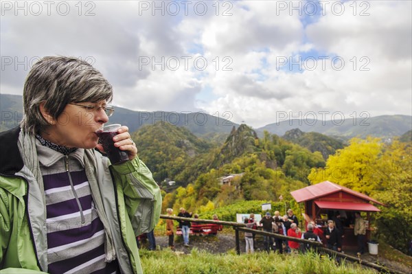 A woman enjoying a cup of Federroter