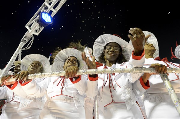Elderly women of the 'Velha Guarda' on an allegorical float