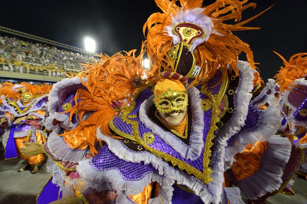 Man wearing a colourful costume