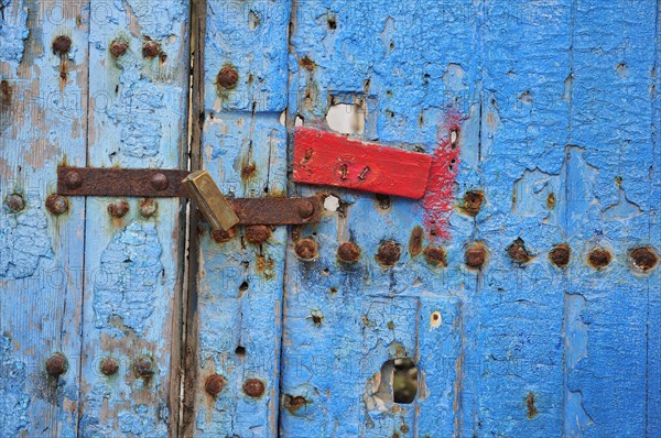 Old door with a padlock