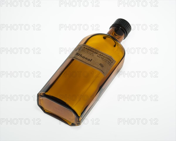 Lying empty brown bottle