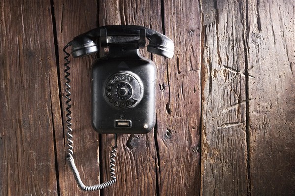 Old Bakelite wall telephone from 1950