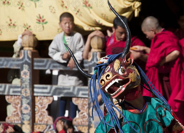 Masked dancer at Tsechu festival