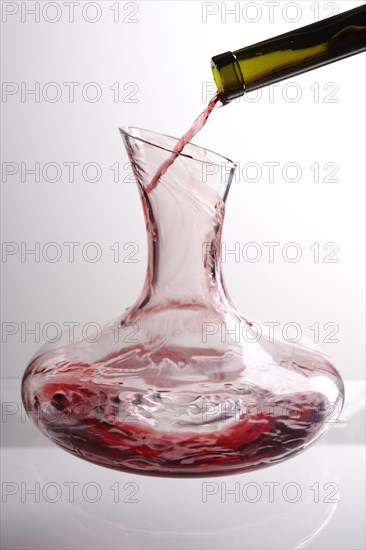 Red wine being decanted