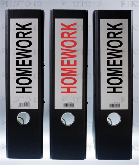 File folders labeled 'Homework'