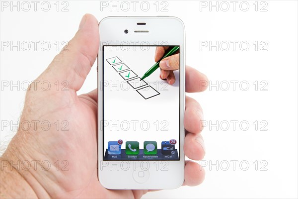Boxes are ticked off on the display of a smartphone