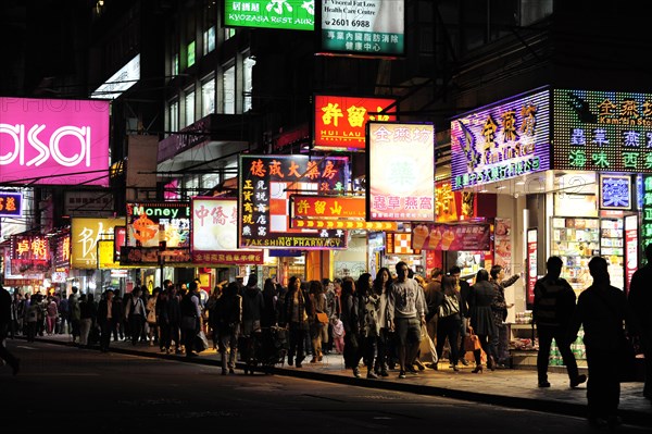 Shops and neon signs in a street