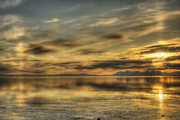 Sunset and halos over Cook Inlet