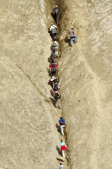People climbing inside Viti Crater