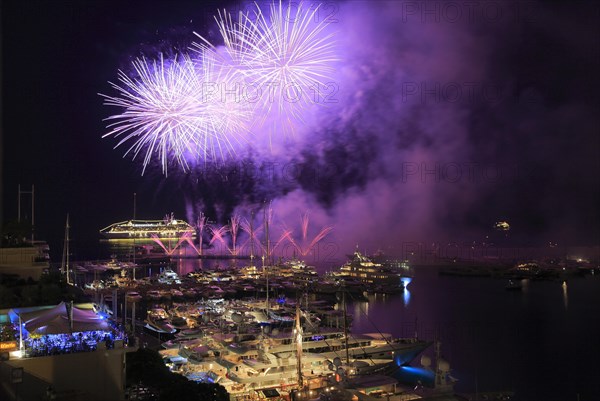 Fireworks over Port Hercule with yachts and cruise ship