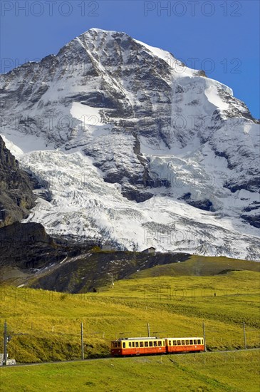 Junfraujoch funicular railway in front of the Moench from Kleine Scheidegg