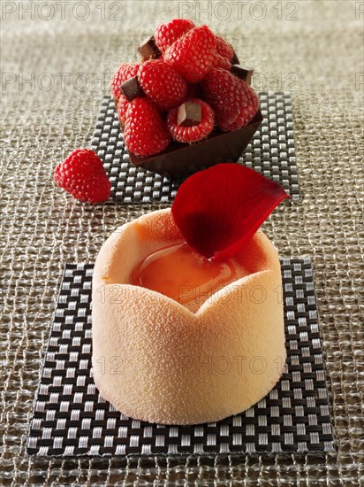 White chocolate cake with a sponge case and strawberry filling