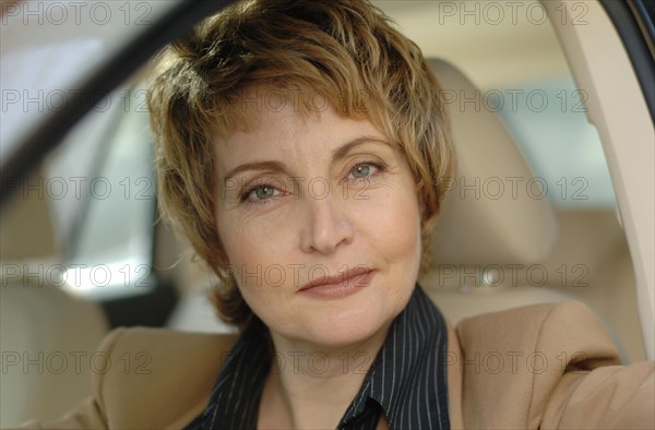 Businesswoman sitting in a car