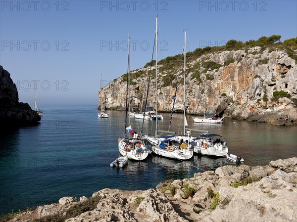 Yachts moored in the bay of Cales Coves