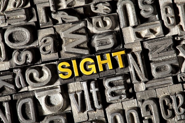 Old lead letters forming the word 'SIGHT'