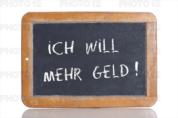 Old school blackboard with the words ICH WILL MEHR GELD!