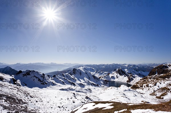 View while ascending Wilde Kreuzspitze Mountain over the Pfunderer Mountains