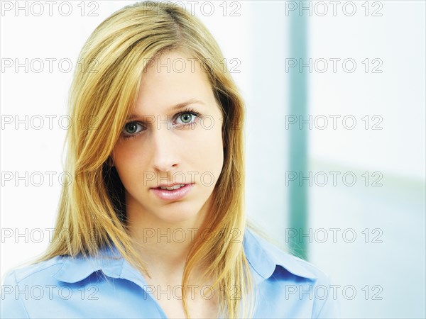 Young woman wearing a blue blouse