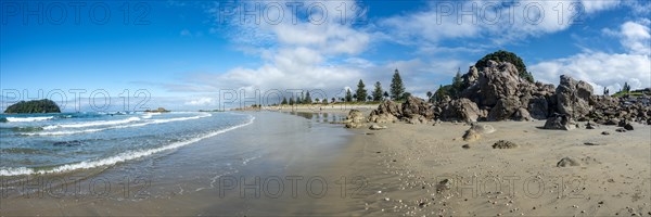 Sandy beach beach of Mount Manganui with island Motiti Island