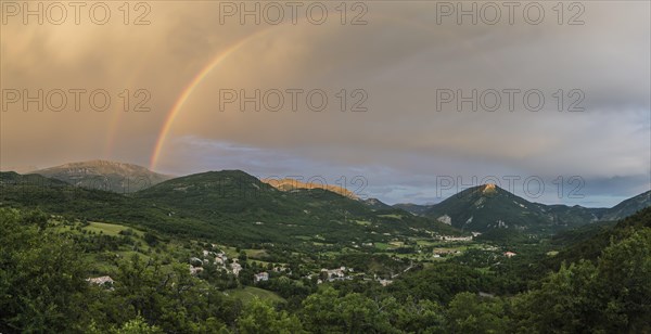 Panorama with rainbow after thunderstorm over the valley of Castellane