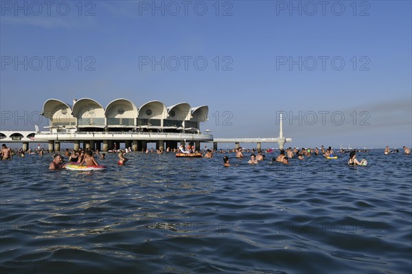 Tourists bathing in the sea