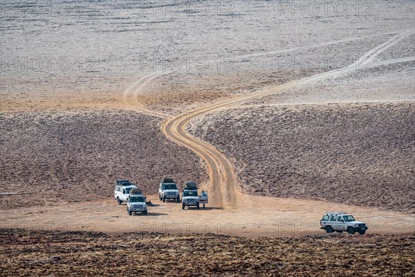 Tourist Vehicles parking in the salt flat