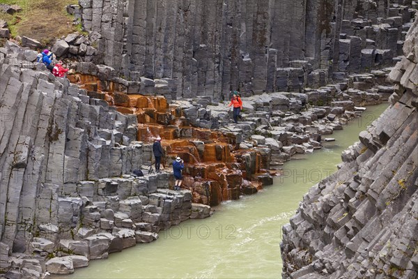 Studlagil gorge with basalt columns and glacial river Jokulsa a Bru