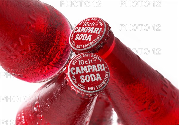 Three Campari soda bottles