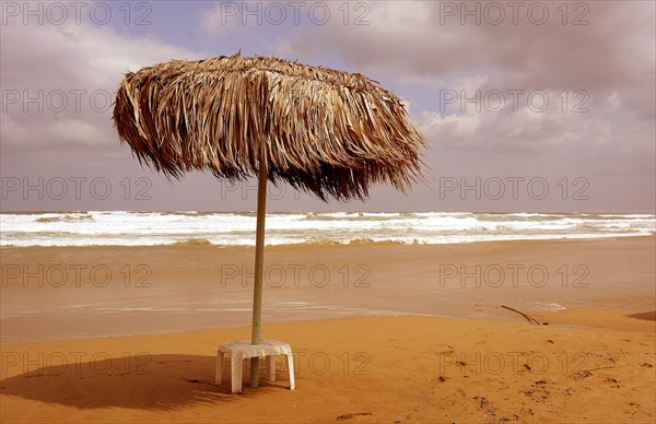Parasol at the beach of Georgioupolis