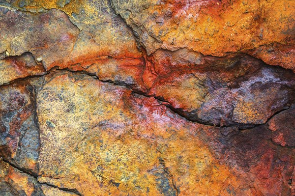 Colourful rust on a ferrous rock