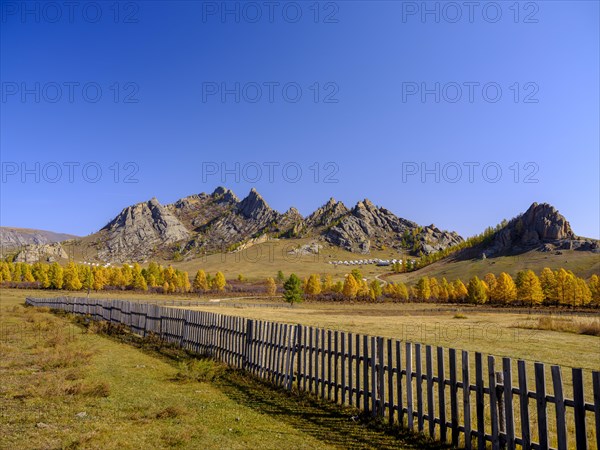 Autumnal colored trees and rocks in Gorky Terelj National Park