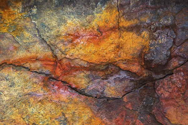 Colourful rust on a ferrous rock