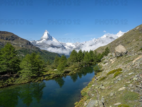 View over Lake Grindij with snow-covered Matterhorn