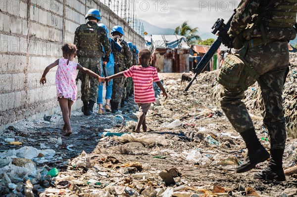 Two children and UN patrol