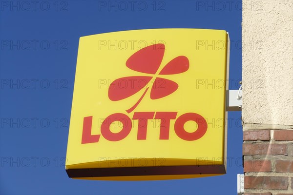Sign with logo Lotto