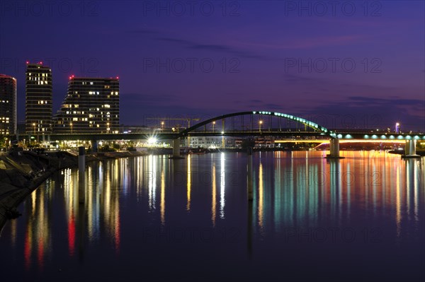 City view at night with water reflection