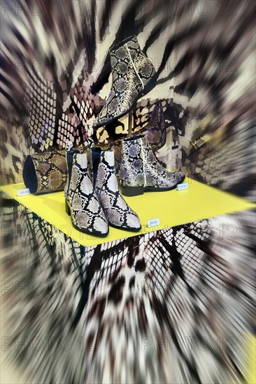 Shop window with snakeskin boots