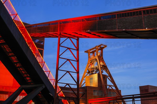 UNESCO World Heritage Zeche Zollverein illuminated red in the evening