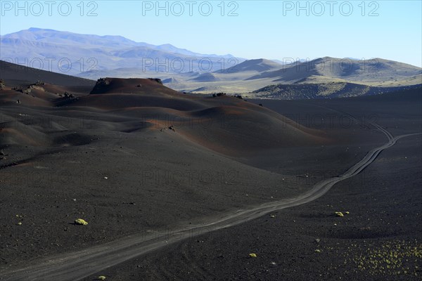 Track through volcanic lunar landscape