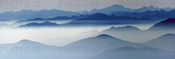 Blue graded mountain ranges in backlight
