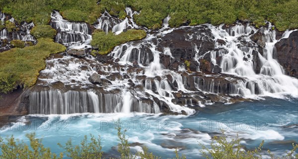Hraunfossar Waterfalls with river Hvita
