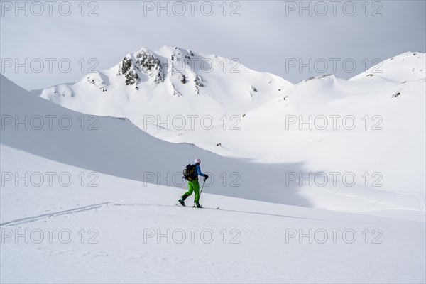 Ski tourers in the snow