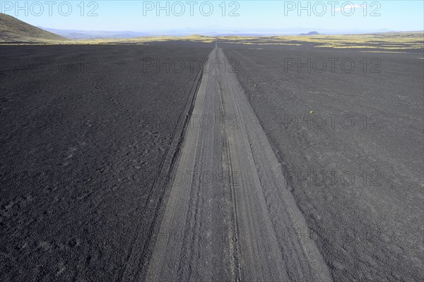 Track through volcanic lunar landscape