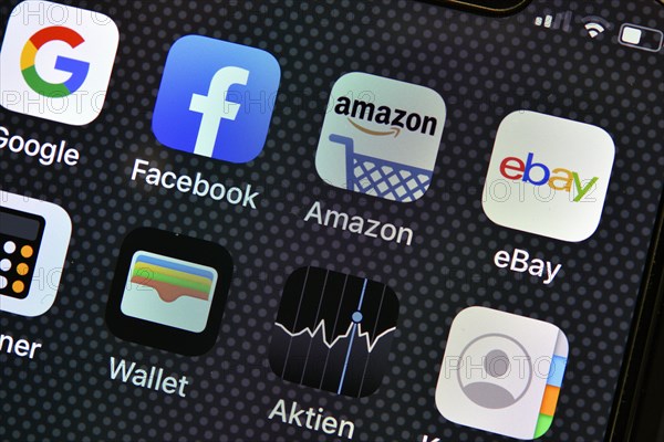 Various software apps on display of an Apple iPhone