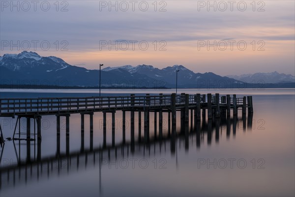 Footbridge at sunset at Chiemsee