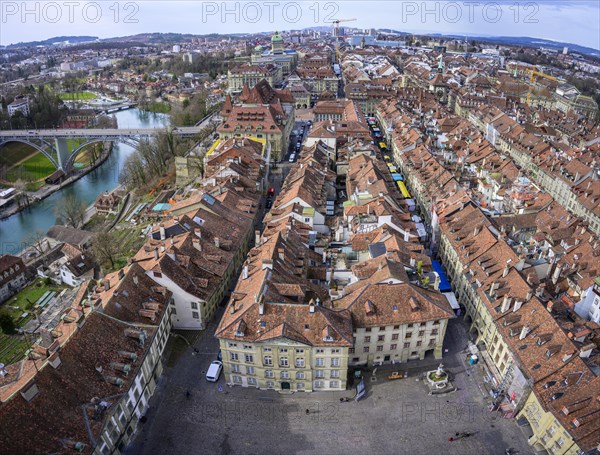 View from the Bernese Minster to the Muensterplatz and the red tiled roofs of the houses in the historic centre of the old town