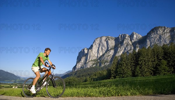 Cyclist on bike tour with mountain bike